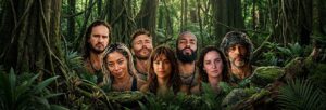 Participantes caminhando pela selva no episódio 8